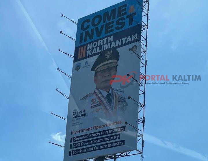 Baliho berisikan informasi ajakan berinvestasi