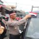 Polresta Bagikan Bendera untuk Rayakan HUT RI ke-80