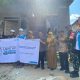 Pemkot Samarinda, PLN UP3 Samarinda, bersama penerima manfaat penyambungan listrik gratis PLN di Jalan Rumbia II, Samarinda.